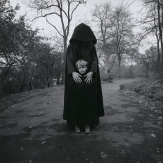 Young Boy and Hooded Figure - New York, 1971